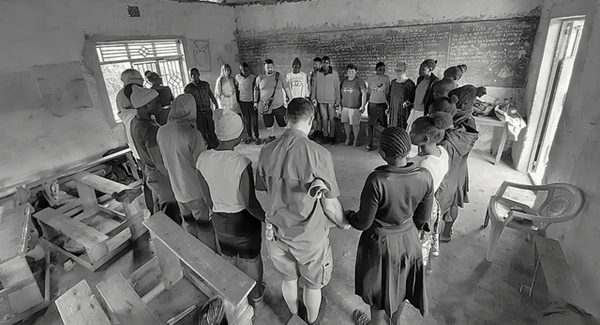 Missions Team Praying in Kenya