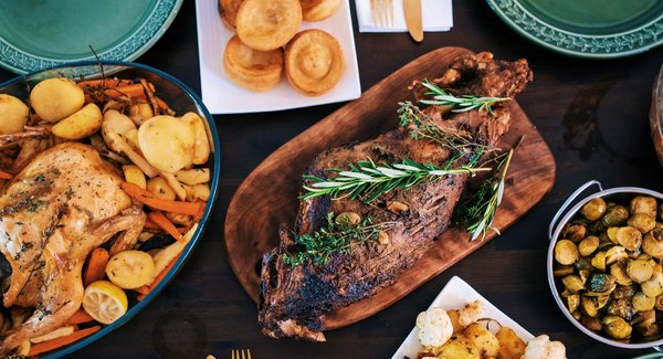 A table of warm dishes for a shared meal